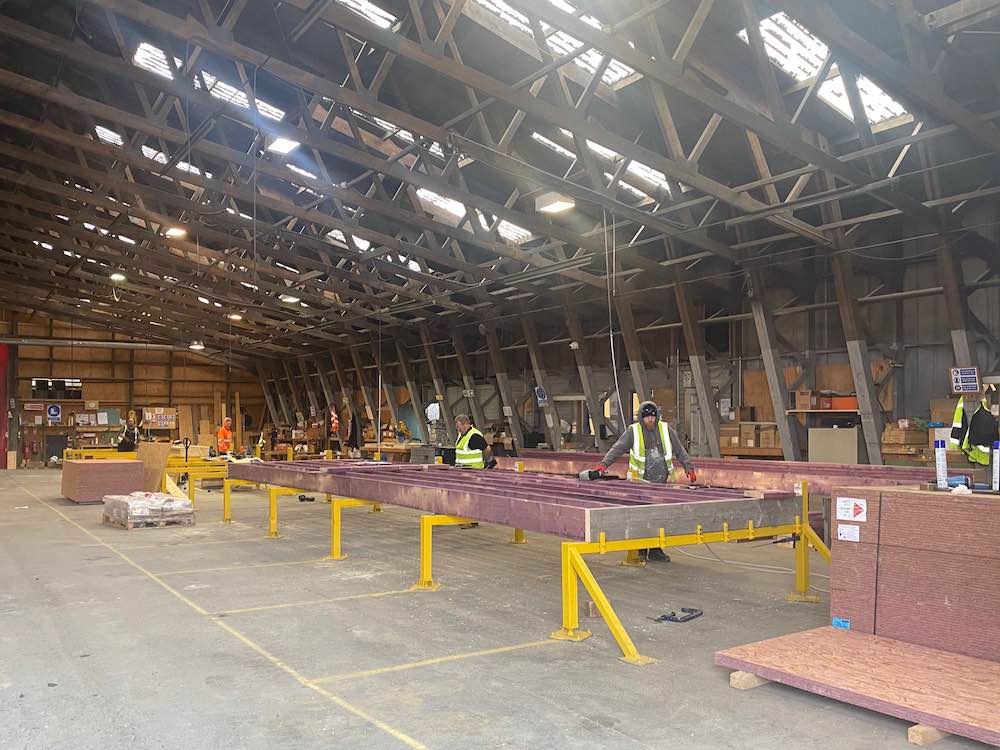 Photo of Carronvale Timber Frame floor cassette factory with people working